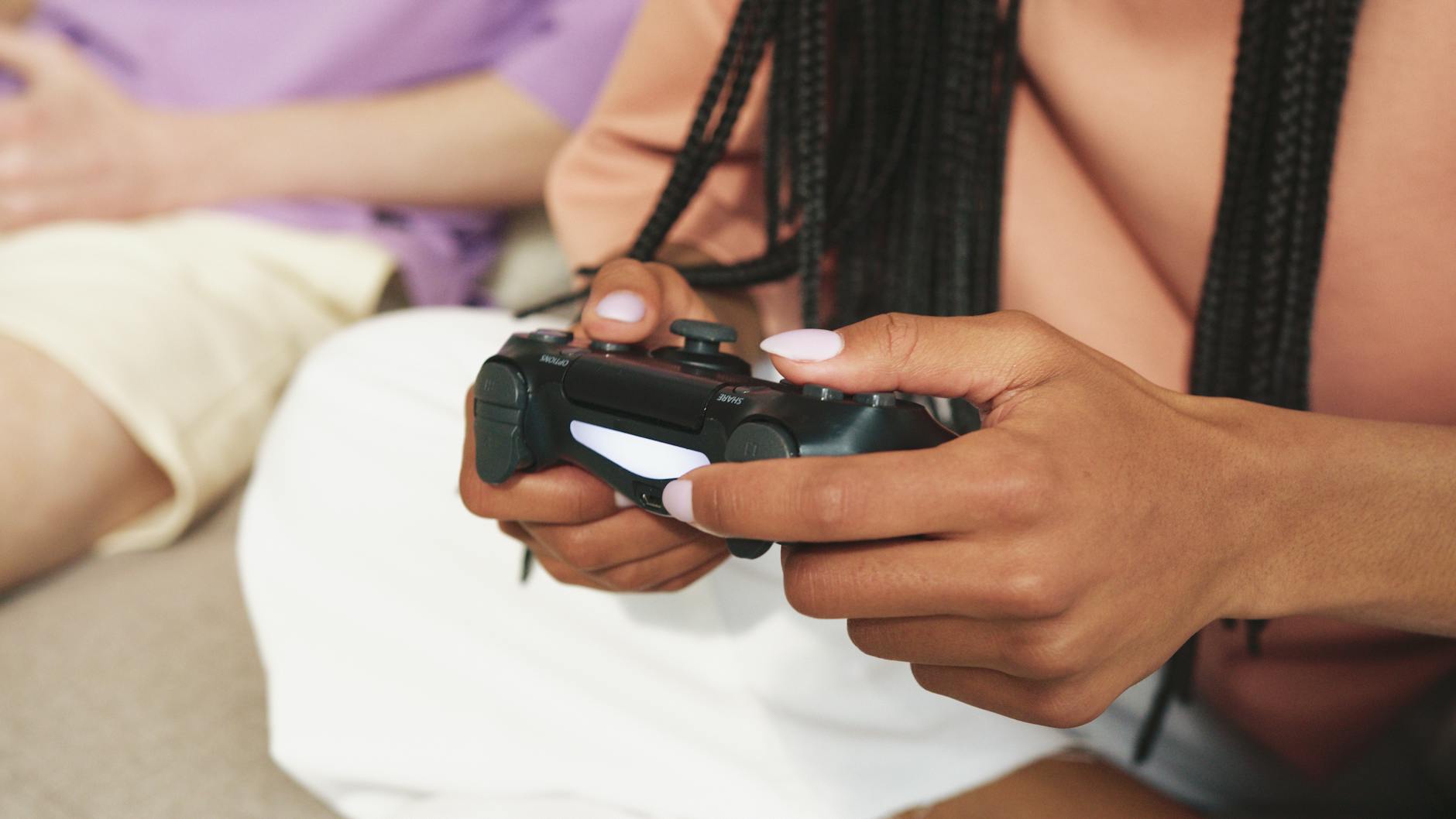 Developers discussing game design at showcase event
